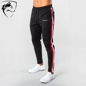 Men’s alphalete double striped joggers in black